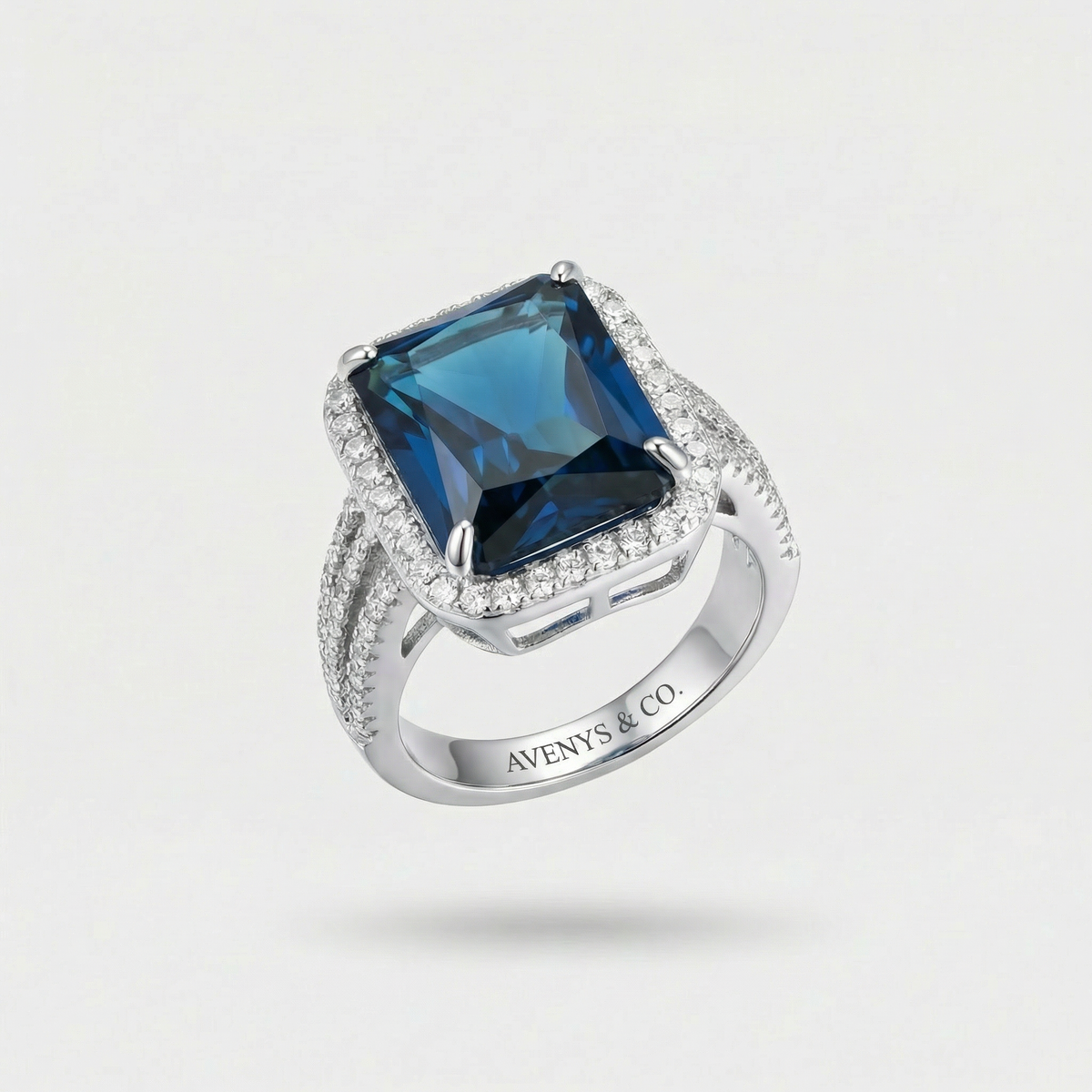 Triple Shank Radiant Ring with Blue Radiant Stone – on White Gold
